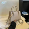 bolso de mano elegante para mujer con correa ajustable
